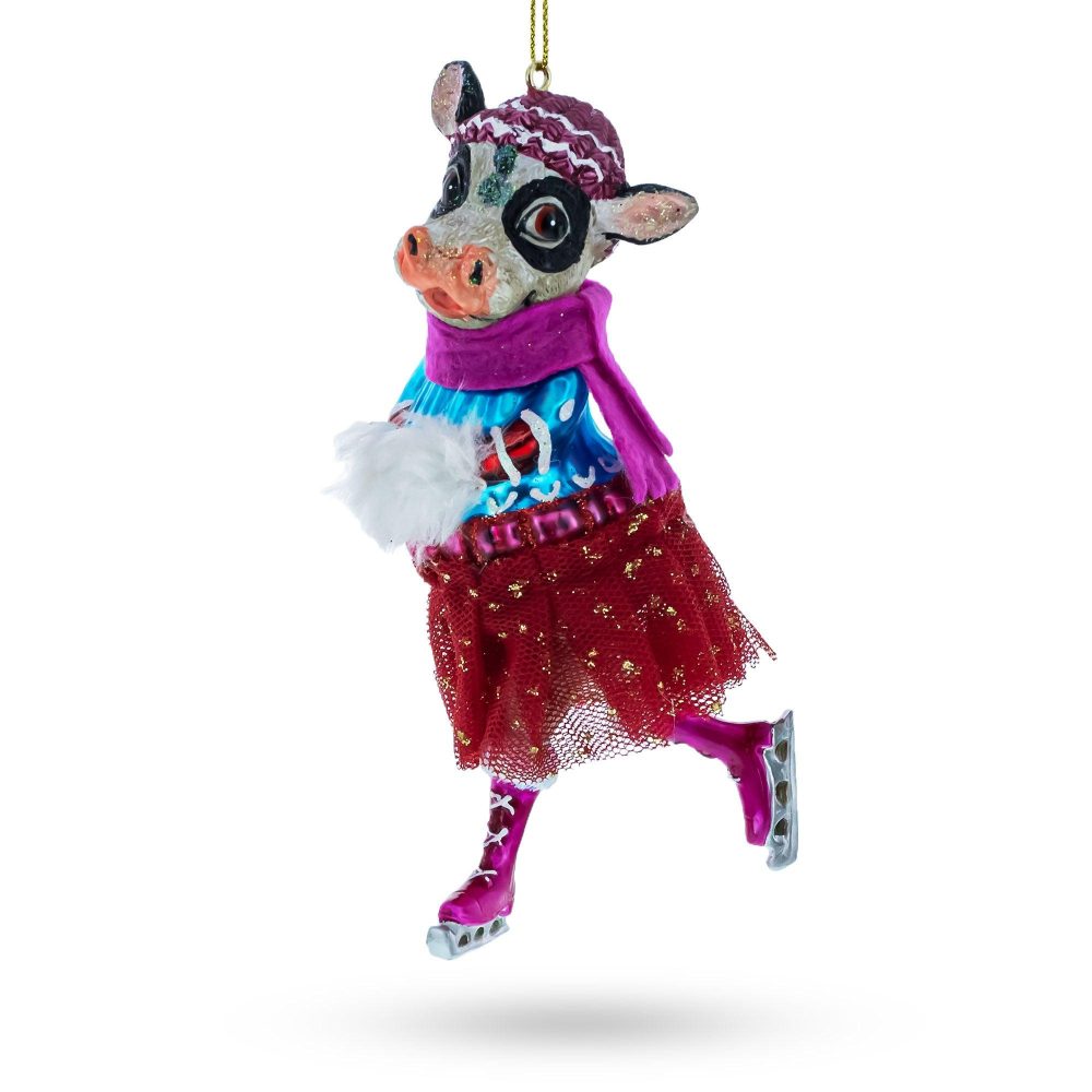 Graceful Cow Ice Skating In Winter Wonderland Blown Glass Christmas Ornament  |   Animals Animals Animals