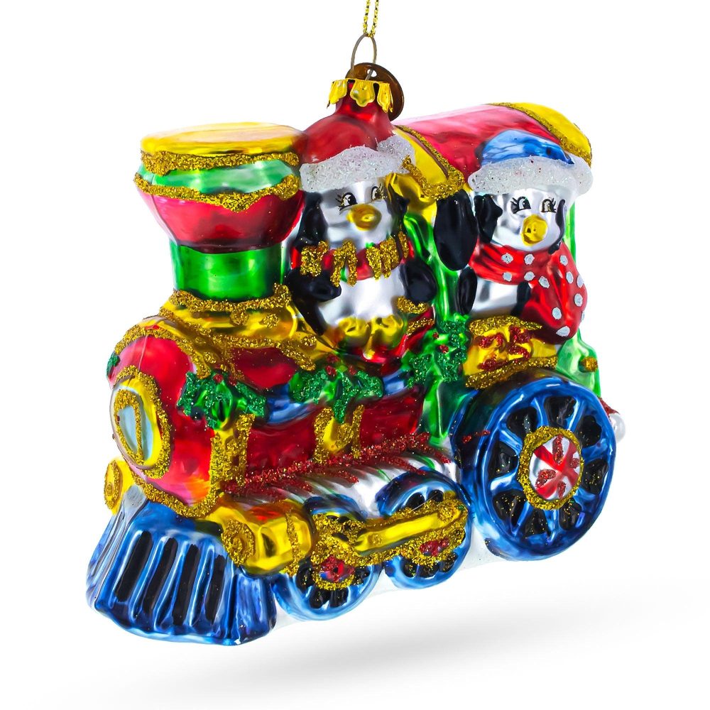 Playful Penguins Riding Train Blown Glass Christmas Ornament  |   Transportation Ornaments Transportation