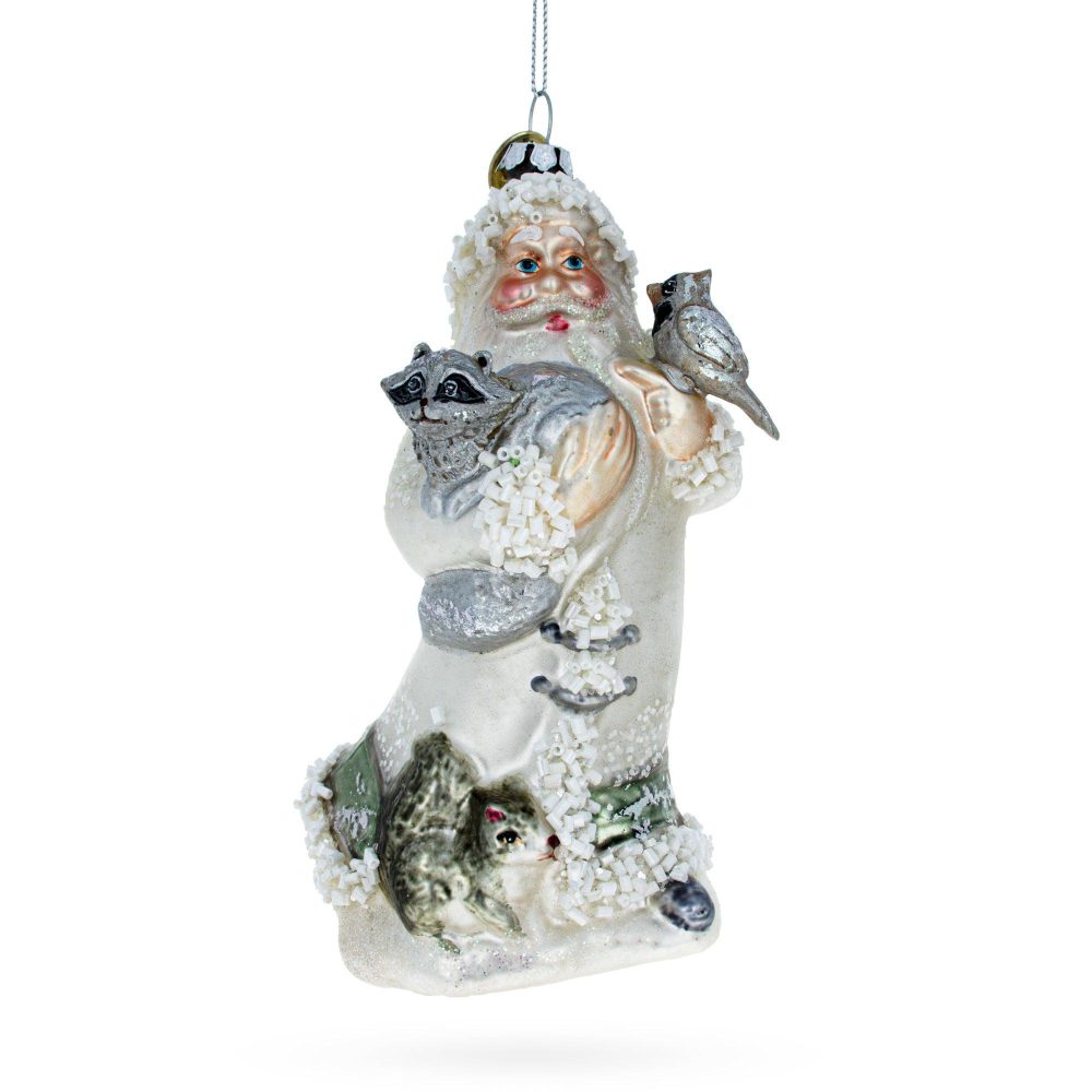 Santa Holding Cardinal And Raccoon Glass Christmas Ornament  |   Santa Ornaments Santa