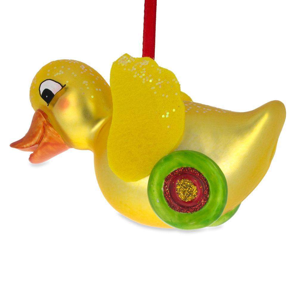 Yellow Duck Rolling On Wheels Blown Glass Christmas Ornament  |   Baby Baby Baby